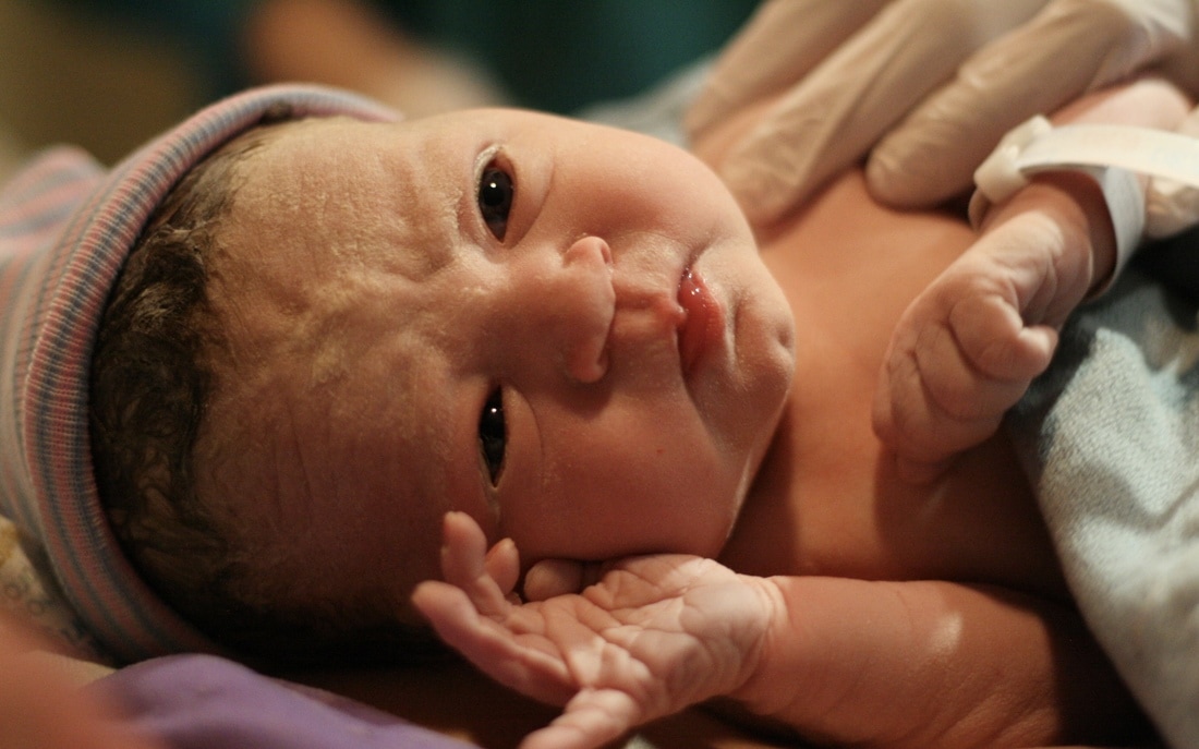Photo of newborn Rebekah, taken by doula Erin Shell